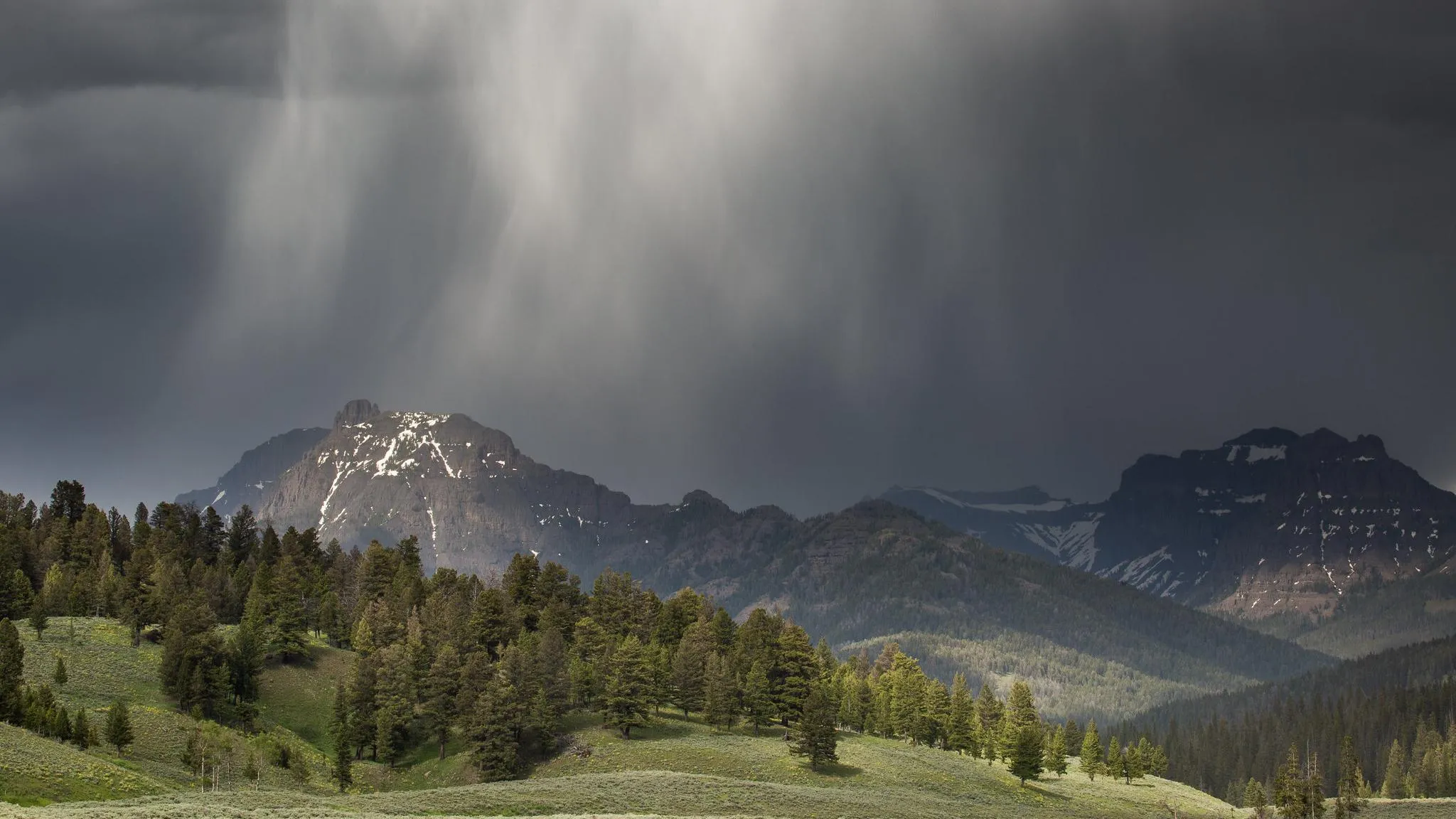 Dramatic mountain peaks and storm clouds over Yellowstone's Wyoming section