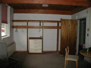Interior view of Yellowstone employee dorm room showing living conditions