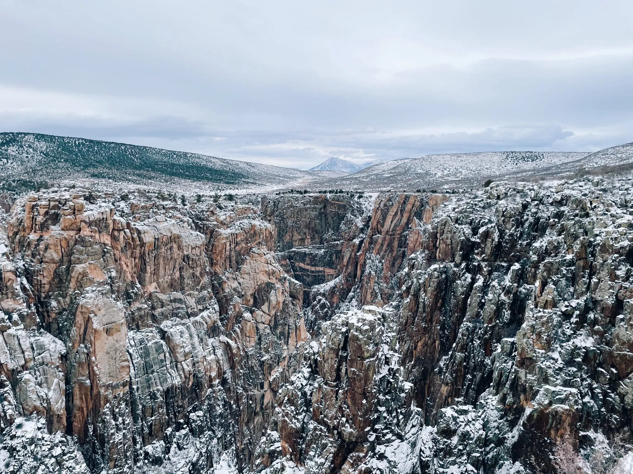 Snow-covered Black Canyon of the Gunnison winter scenic views with dramatic canyon walls